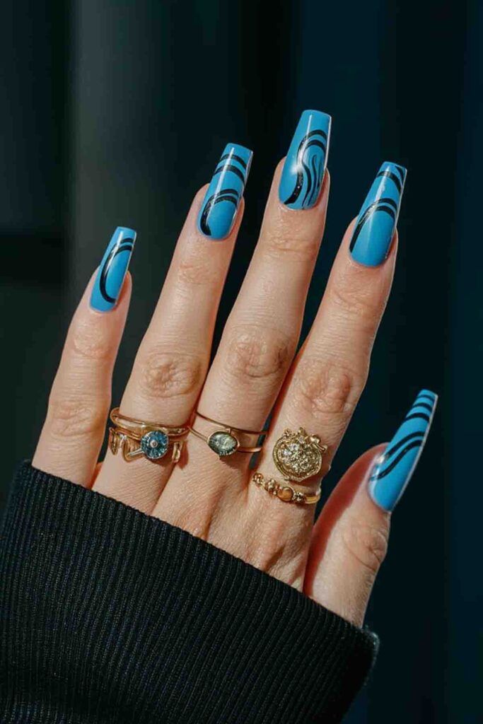 Electric Blue with Black Swirls Nails
