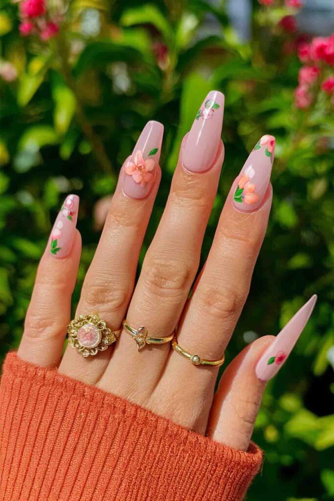 Peach Pink with Floral Designs Nails